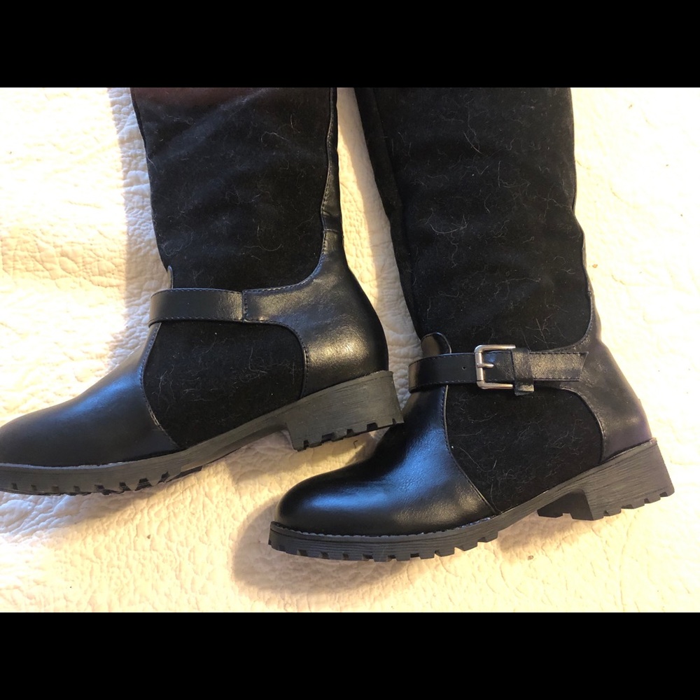 Knee high black boots  size 9. Buckle trim